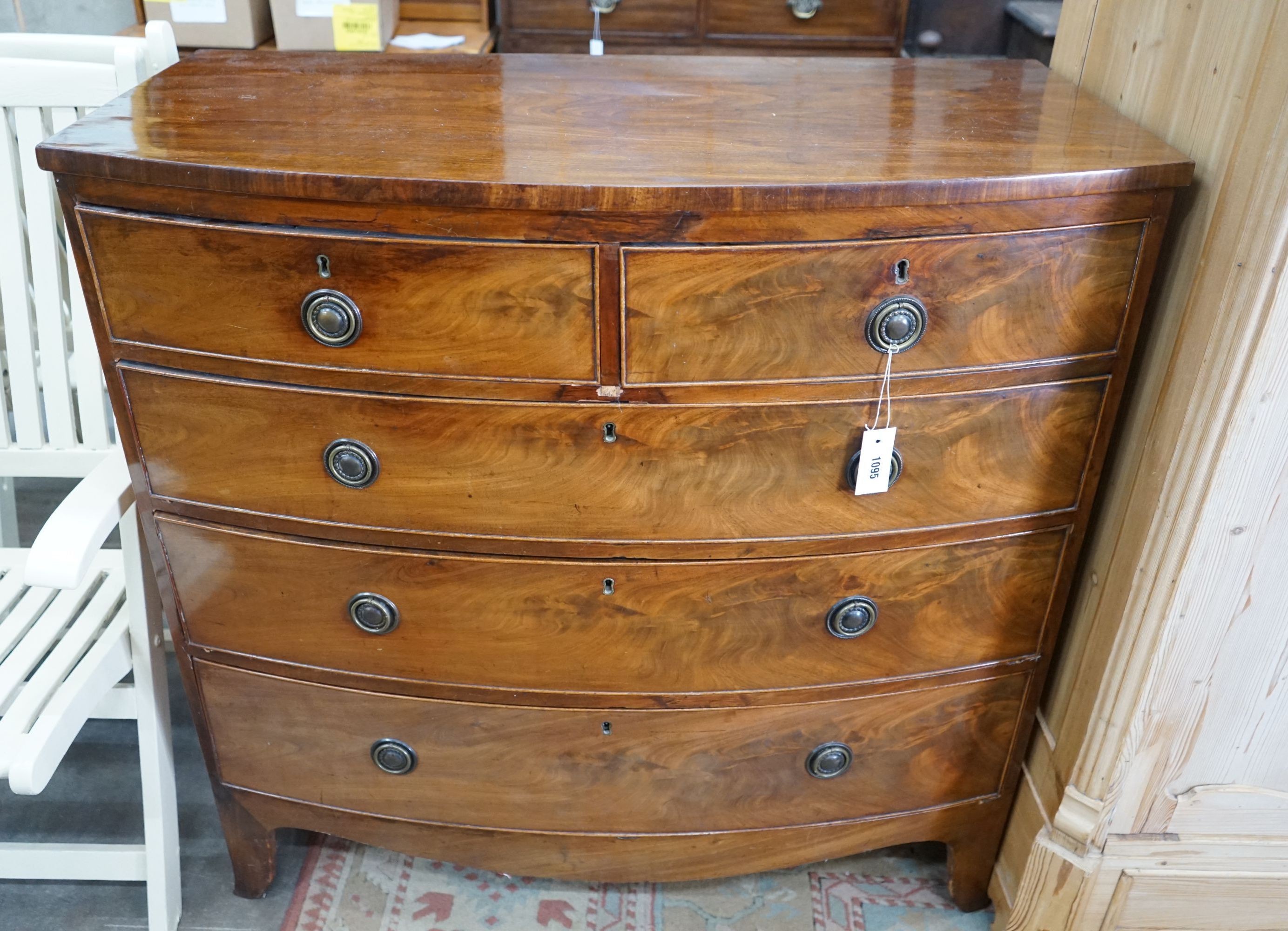 A Regency mahogany bow front chest, width 106cm, depth 53cm, height 104cm